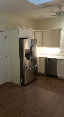 Kitchen with cream colored cabinets